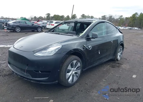 2023 Tesla Model Y Awd/Long Range Dual Motor All-Wheel Drive z USA, uszkodzony, nr VIN 7SAYGDEE2PA187134